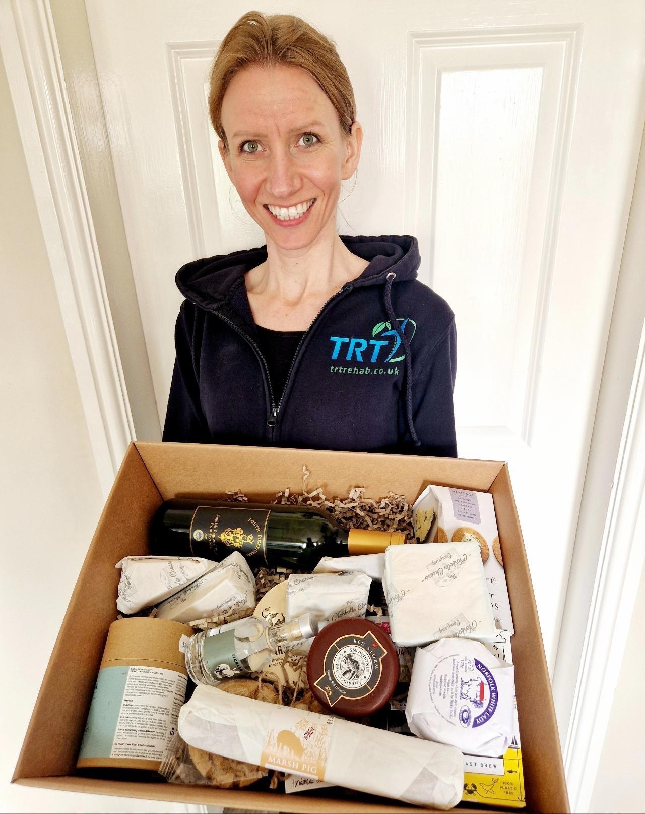 Iwona Michalska holding luxury hamper